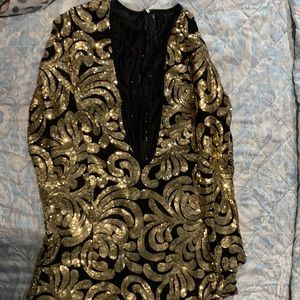 Beautiful black and gold romper